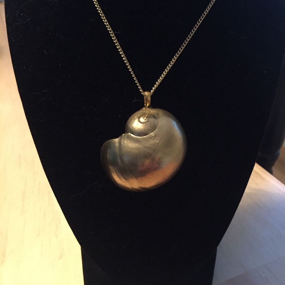 Gold tone Moon Snail Pendant Necklace.